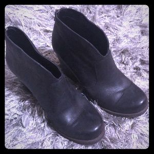 Black booties with back zipper.